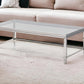 55" Clear And Silver Glass And Steel Coffee Table