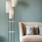 68" Steel Three Light Floor Lamp With White Linen Cylinder Shades